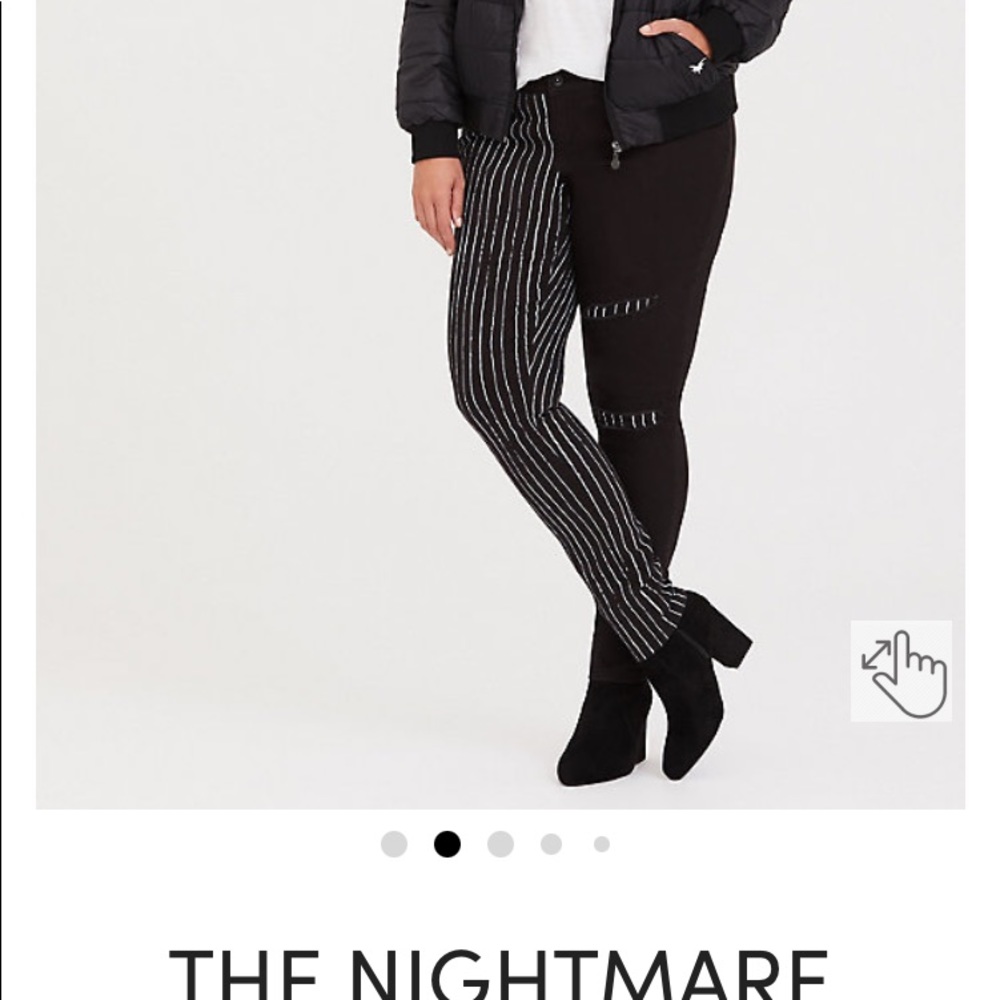Torrid The night before Christmas skinny jeans.